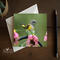 A blank greeting card featuring fine photography of an American redstart in a dahlia garden, and is available at Cove Creek Photography.